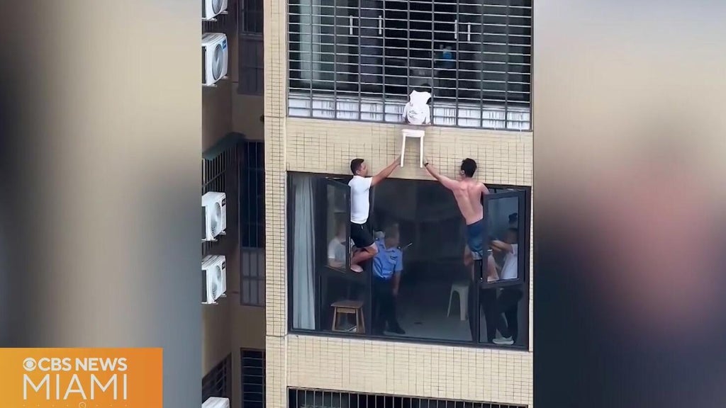 Video shows 3-year-old dangling from 12th-floor window in China — CBS Miami, Pinecrest Community news